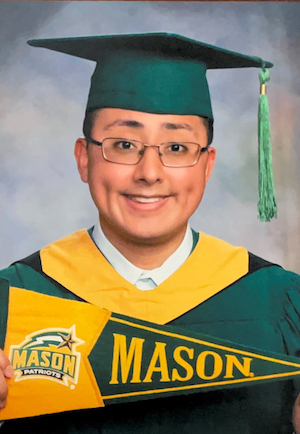 young man in cap and gown